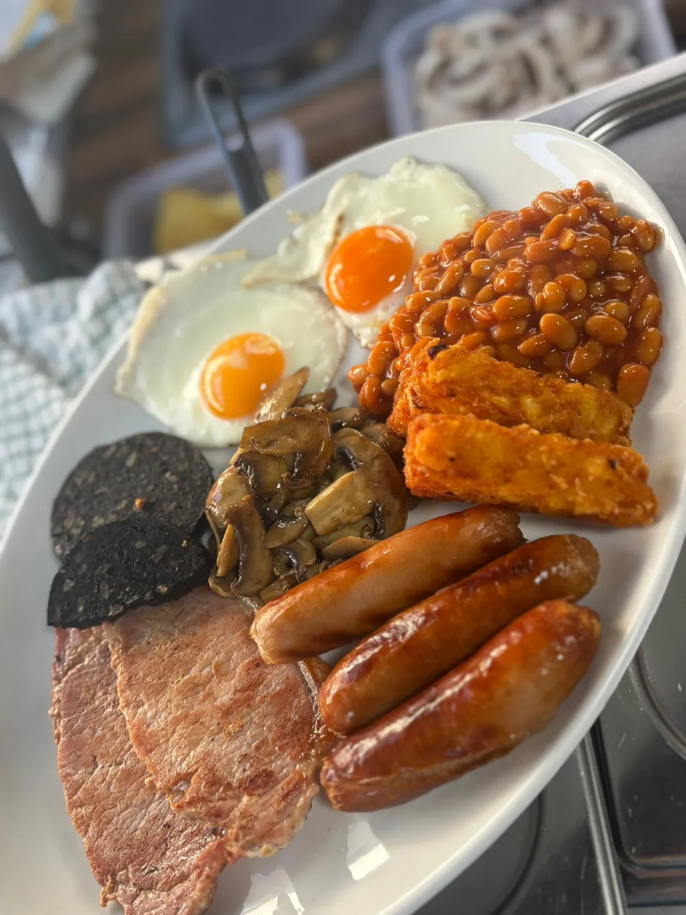 Barney's Big Breakfast — two fried eggs, local sausages, gammon, bacon, beans, hash browns, black pudding and mushrooms, griddle-cooked in Ponthir